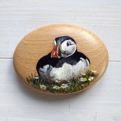Sitting puffin art pebble
